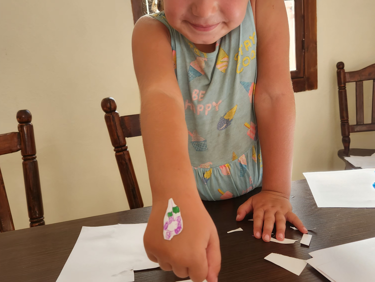 Girl with her first sticker on her hand